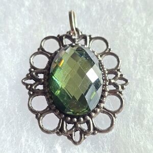 Sparkly green pendant ornate Victorian revival style antiqued silver tone